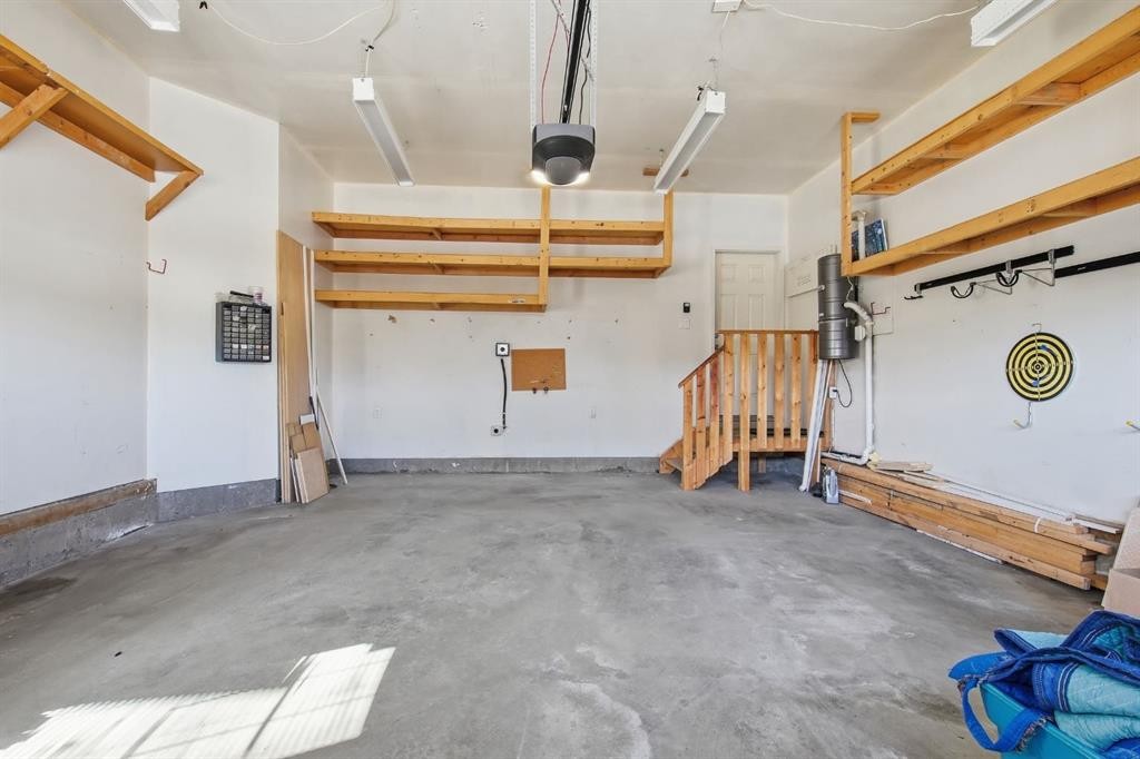 101 Evansborough Green Nw, Calgary, AB - Indoor Photo Showing Garage