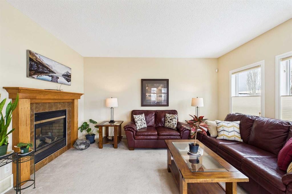 167 Evanston View Nw, Calgary, AB - Indoor Photo Showing Living Room With Fireplace