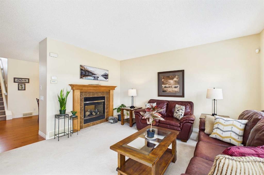 167 Evanston View Nw, Calgary, AB - Indoor Photo Showing Living Room With Fireplace
