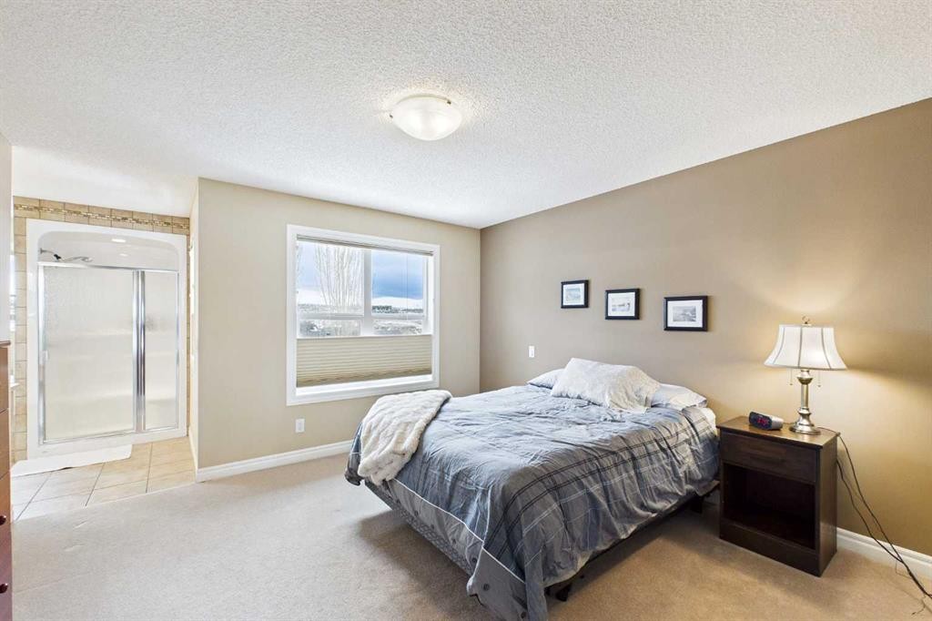 167 Evanston View Nw, Calgary, AB - Indoor Photo Showing Bedroom