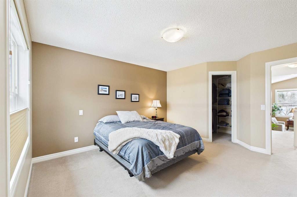 167 Evanston View Nw, Calgary, AB - Indoor Photo Showing Bedroom