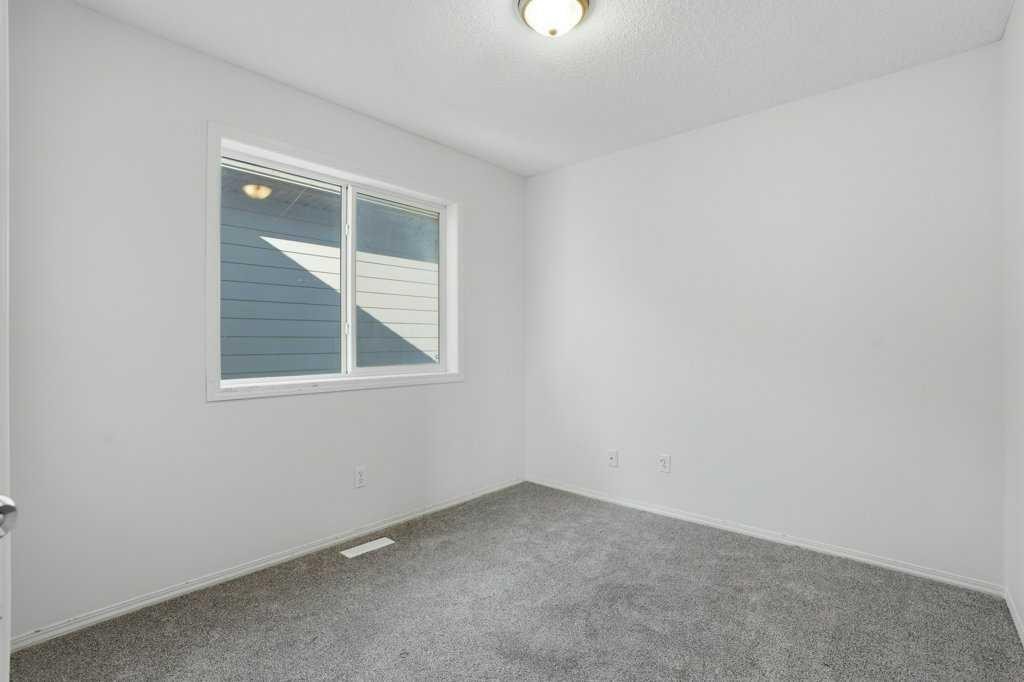 53 Saddlecrest Place Ne, Calgary, AB - Indoor Photo Showing Other Room