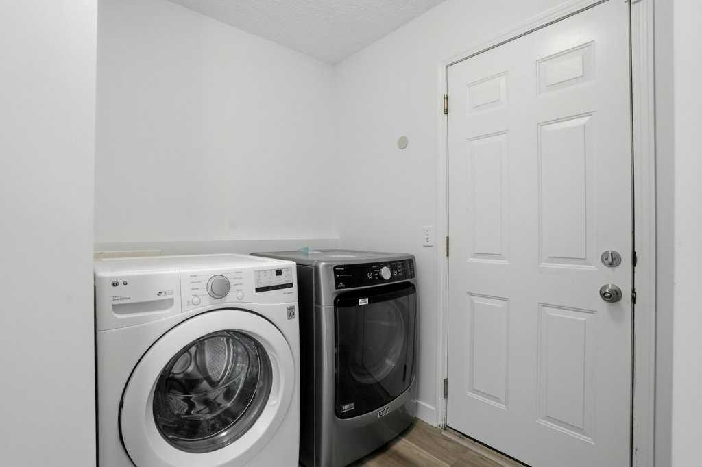 53 Saddlecrest Place Ne, Calgary, AB - Indoor Photo Showing Laundry Room
