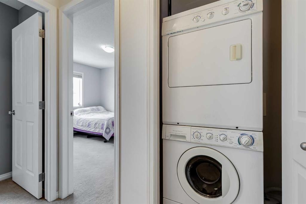 2 Everridge Villas Sw, Calgary, AB - Indoor Photo Showing Laundry Room