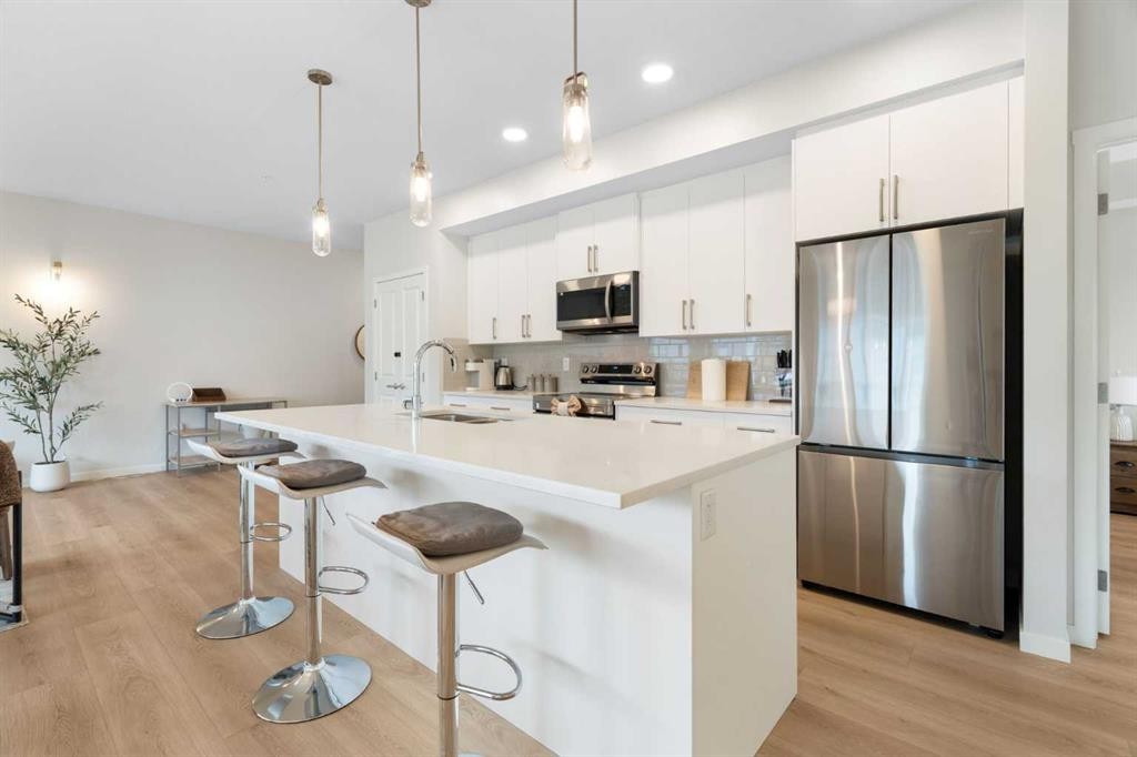 6412-20295 Seton Way Se, Calgary, AB - Indoor Photo Showing Kitchen With Stainless Steel Kitchen With Upgraded Kitchen