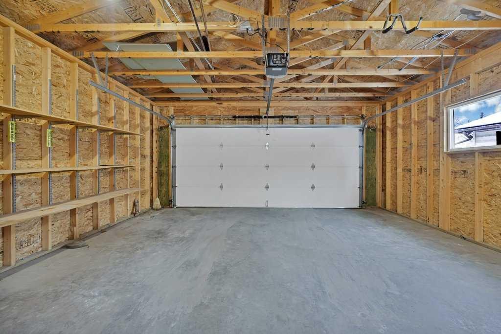 480 Midridge Drive Se, Calgary, AB - Indoor Photo Showing Garage