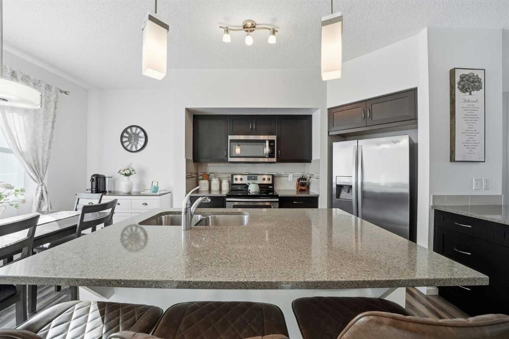 189 Mahogany Drive, Calgary, AB - Indoor Photo Showing Kitchen With Stainless Steel Kitchen With Double Sink With Upgraded Kitchen