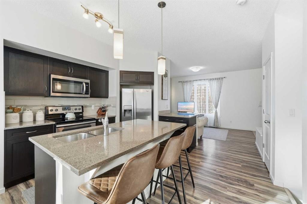 189 Mahogany Drive, Calgary, AB - Indoor Photo Showing Kitchen With Stainless Steel Kitchen With Double Sink With Upgraded Kitchen