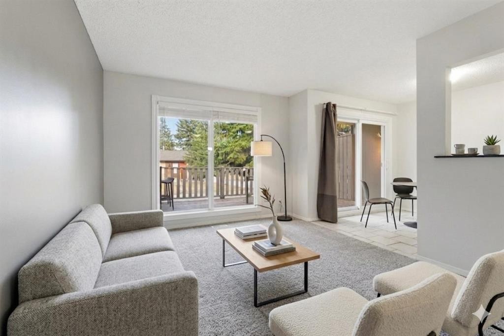 6137 Maddock Drive Ne, Calgary, AB - Indoor Photo Showing Living Room