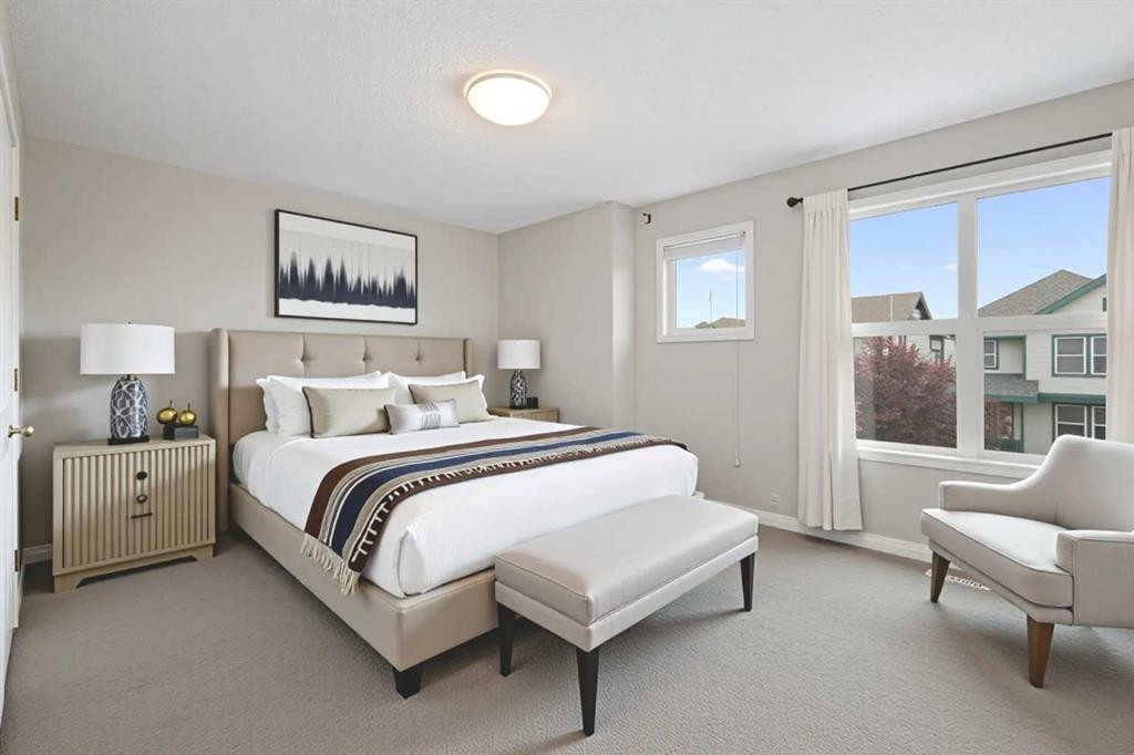 221 Prestwick Terrace Se, Calgary, AB - Indoor Photo Showing Bedroom