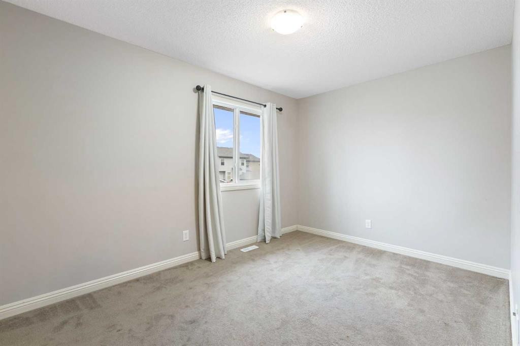 221 Prestwick Terrace Se, Calgary, AB - Indoor Photo Showing Other Room