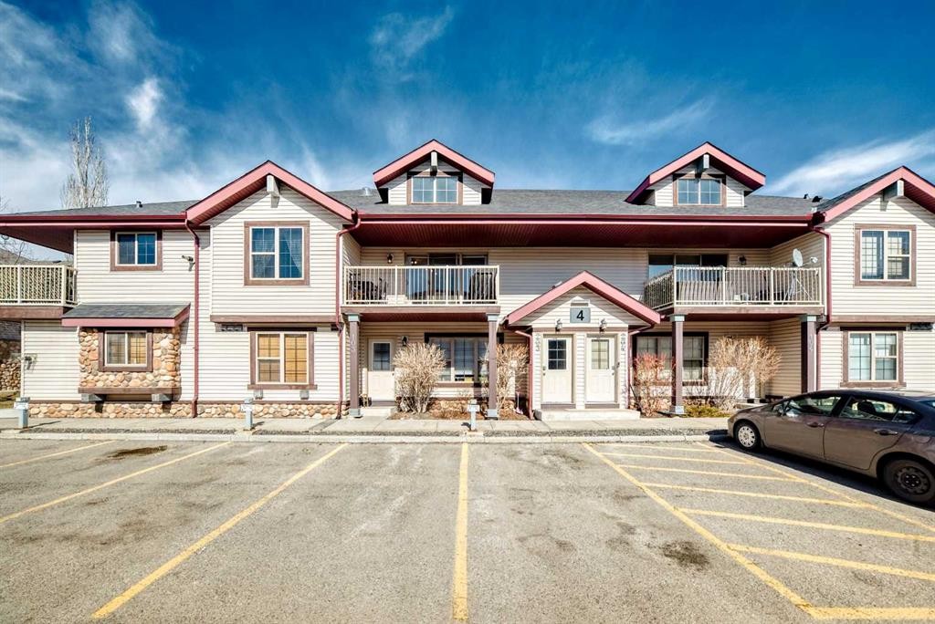 203-4 Everridge Square Sw, Calgary, AB - Outdoor With Balcony With Facade