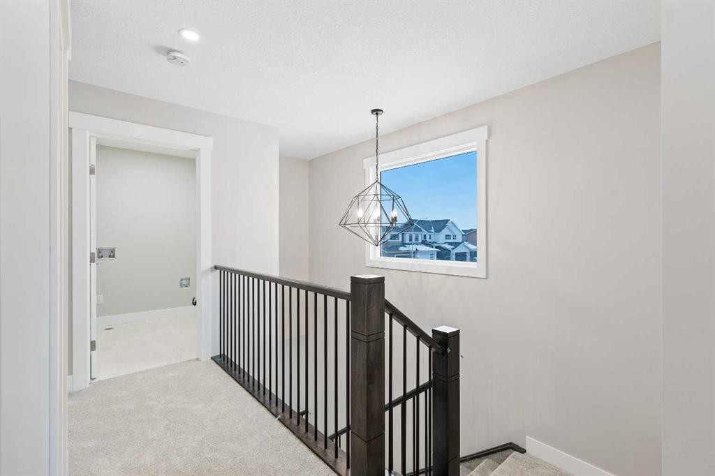 56 Bridges Drive, Langdon, AB - Indoor Photo Showing Other Room