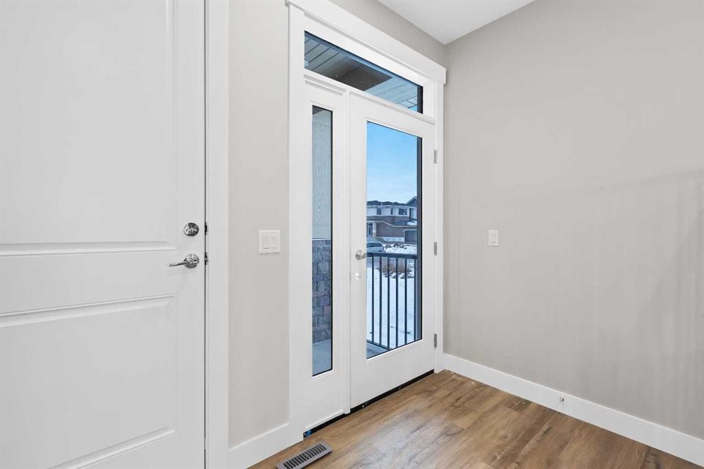 56 Bridges Drive, Langdon, AB - Indoor Photo Showing Other Room