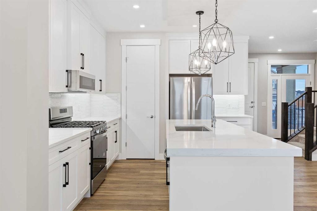 56 Bridges Drive, Langdon, AB - Indoor Photo Showing Kitchen With Upgraded Kitchen