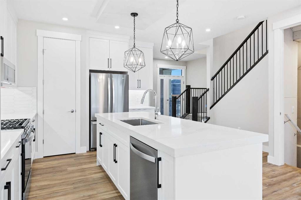 56 Bridges Drive, Langdon, AB - Indoor Photo Showing Kitchen With Upgraded Kitchen