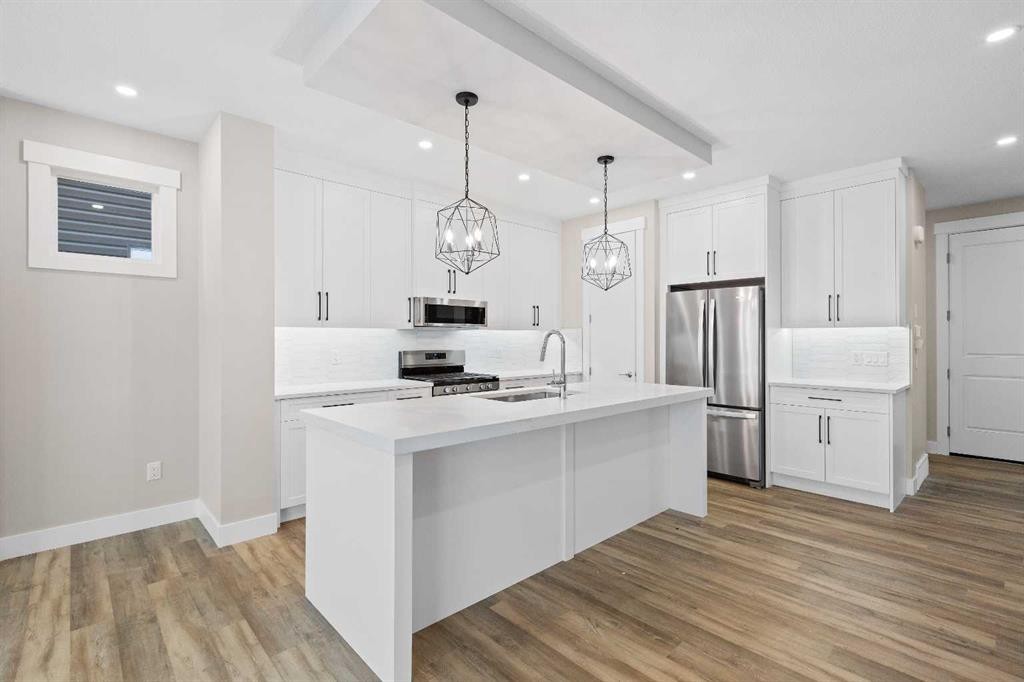 56 Bridges Drive, Langdon, AB - Indoor Photo Showing Kitchen With Upgraded Kitchen
