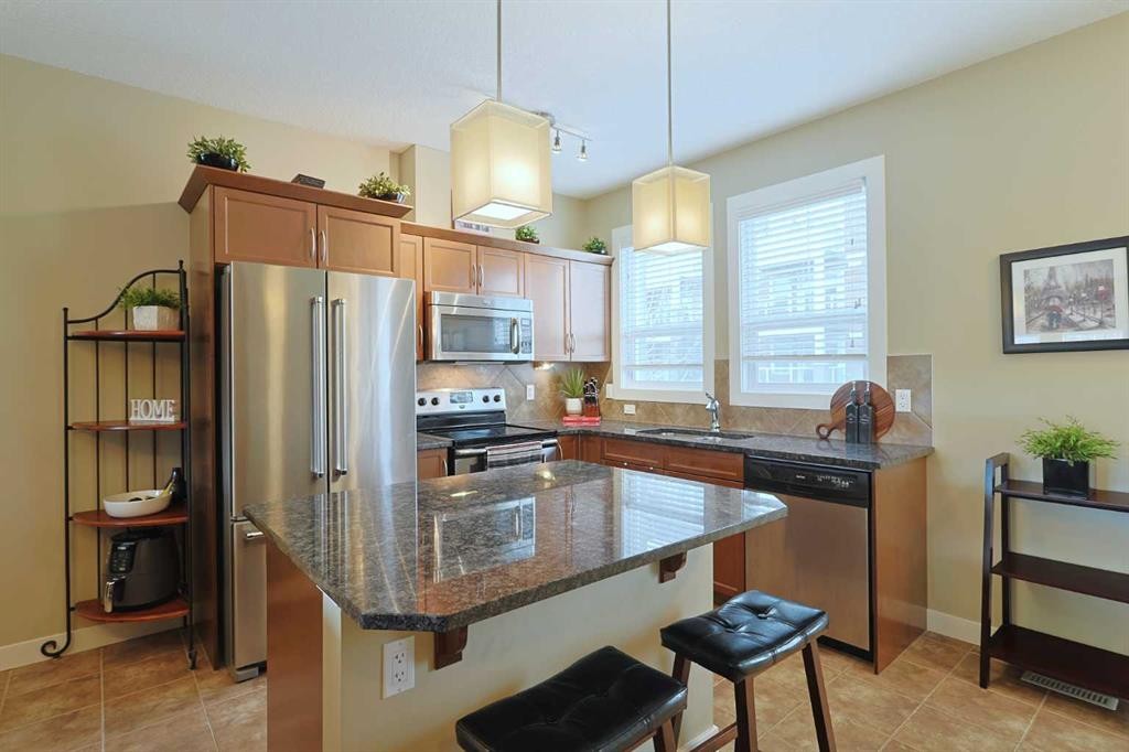 505 Evanston Square Nw, Calgary, AB - Indoor Photo Showing Kitchen With Stainless Steel Kitchen