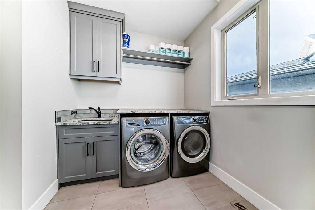 64 Walcrest View Se, Calgary, AB - Indoor Photo Showing Laundry Room