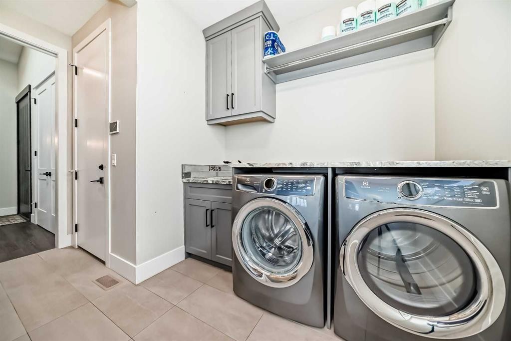 64 Walcrest View Se, Calgary, AB - Indoor Photo Showing Laundry Room