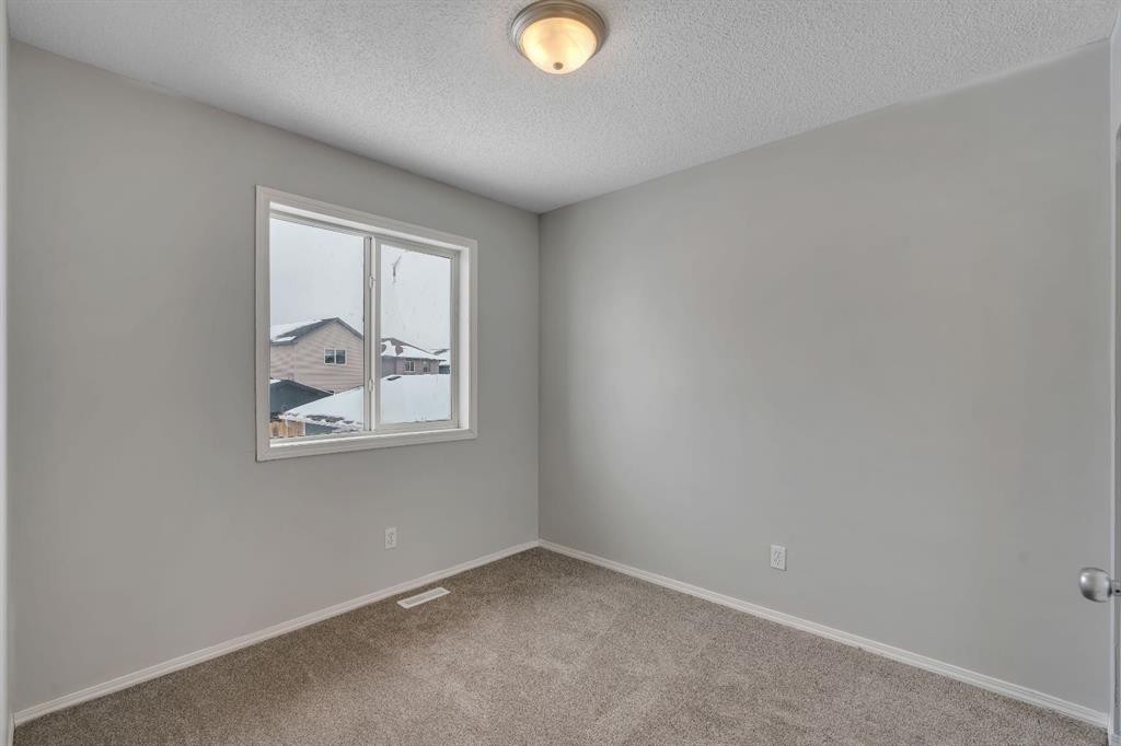 41 Saddlefield Drive Ne, Calgary, AB - Indoor Photo Showing Other Room