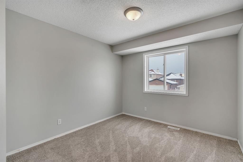 41 Saddlefield Drive Ne, Calgary, AB - Indoor Photo Showing Other Room