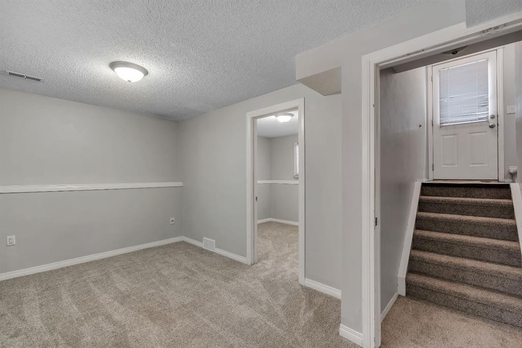 41 Saddlefield Drive Ne, Calgary, AB - Indoor Photo Showing Other Room