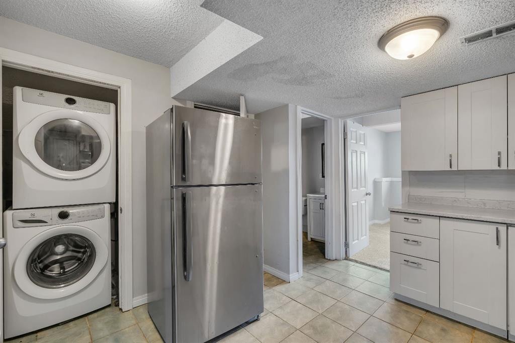41 Saddlefield Drive Ne, Calgary, AB - Indoor Photo Showing Laundry Room