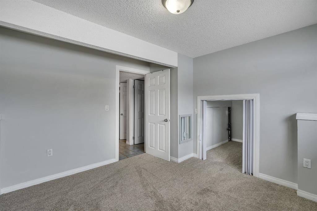 41 Saddlefield Drive Ne, Calgary, AB - Indoor Photo Showing Other Room