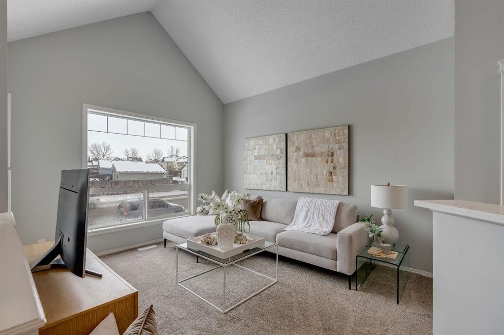 41 Saddlefield Drive Ne, Calgary, AB - Indoor Photo Showing Living Room