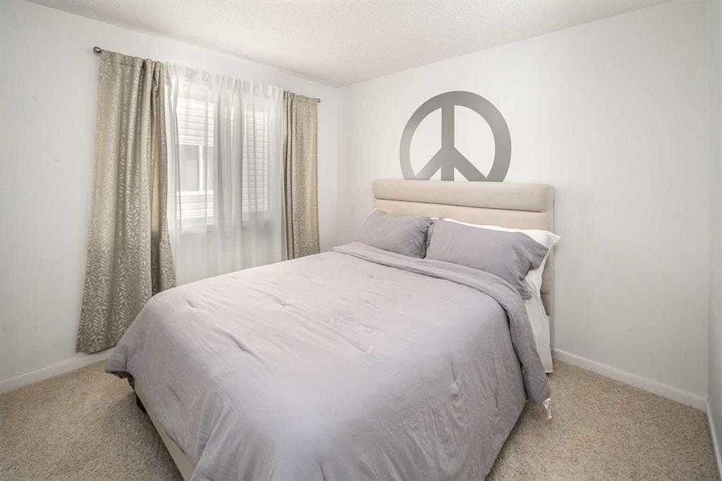 5 Panatella Square Nw, Calgary, AB - Indoor Photo Showing Bedroom