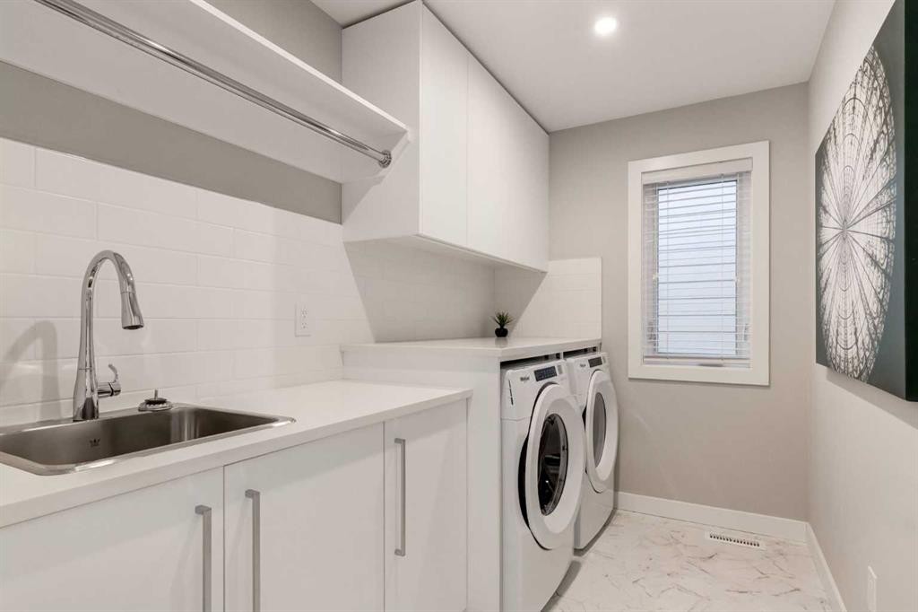 40 Timberline Way Sw, Calgary, AB - Indoor Photo Showing Laundry Room