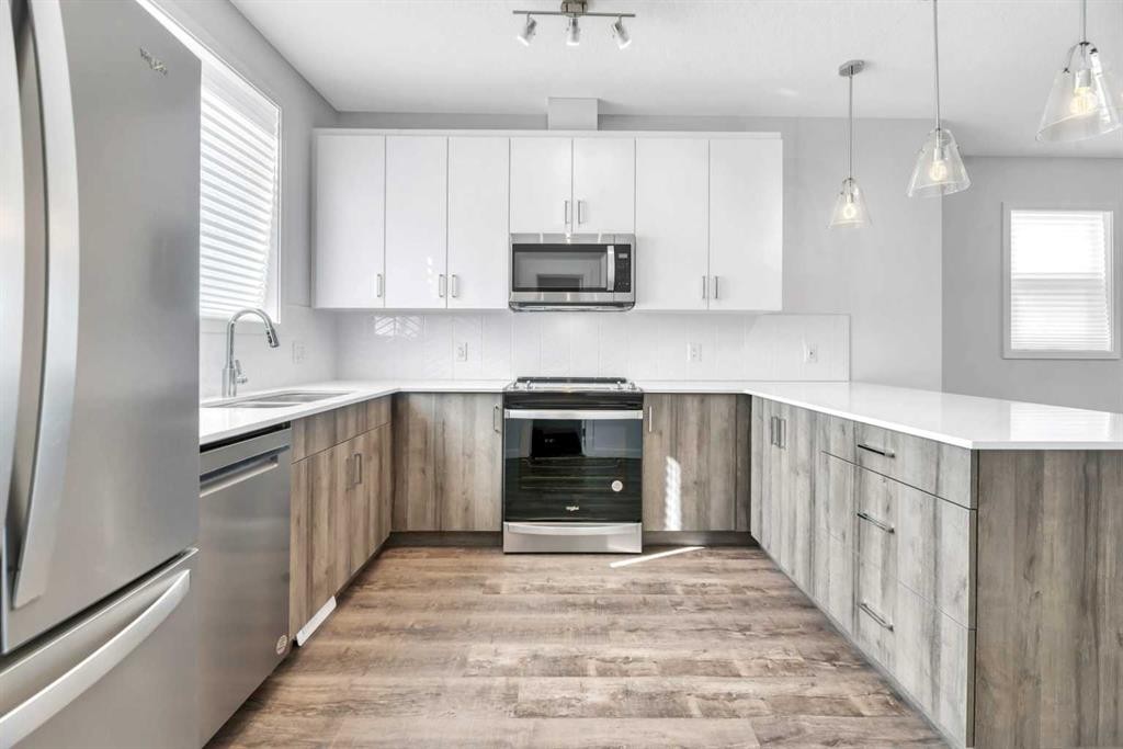 337-301 Redstone Boulevard Ne, Calgary, AB - Indoor Photo Showing Kitchen With Stainless Steel Kitchen With Upgraded Kitchen