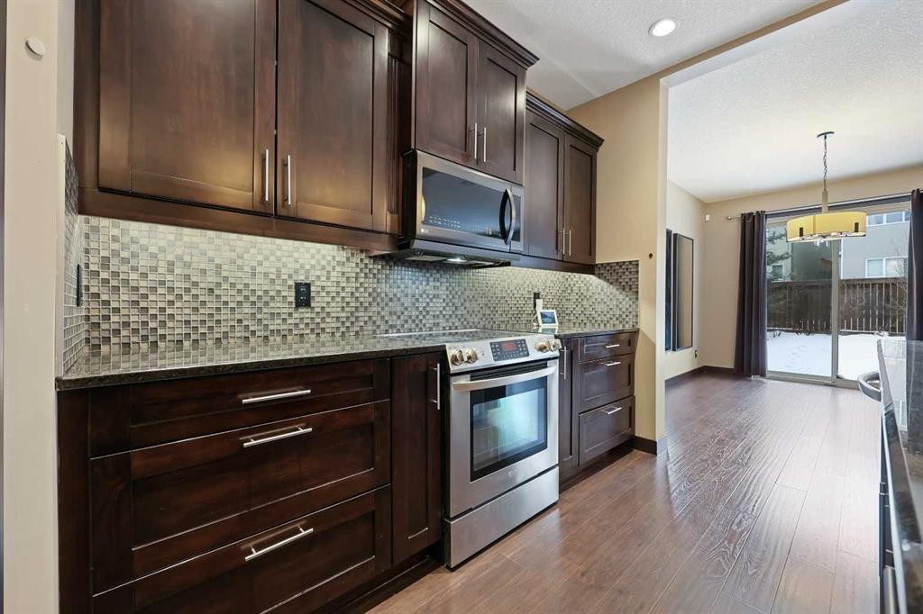 226 Sage Meadows Circle Nw, Calgary, AB - Indoor Photo Showing Kitchen With Stainless Steel Kitchen With Upgraded Kitchen