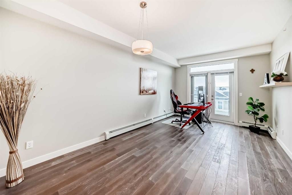 405-2300 Evanston Square, Calgary, AB - Indoor With Fireplace
