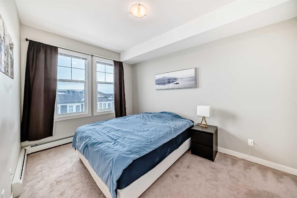 405-2300 Evanston Square, Calgary, AB - Indoor Photo Showing Bedroom