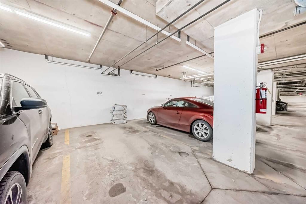 405-2300 Evanston Square, Calgary, AB - Indoor Photo Showing Garage