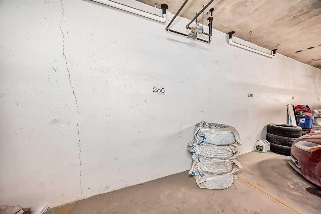 405-2300 Evanston Square, Calgary, AB - Indoor Photo Showing Garage