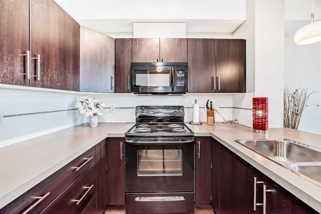 405-2300 Evanston Square, Calgary, AB - Indoor Photo Showing Kitchen