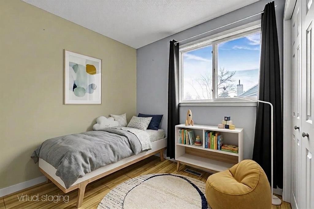 44 Strathclair Rise Sw, Calgary, AB - Indoor Photo Showing Bedroom