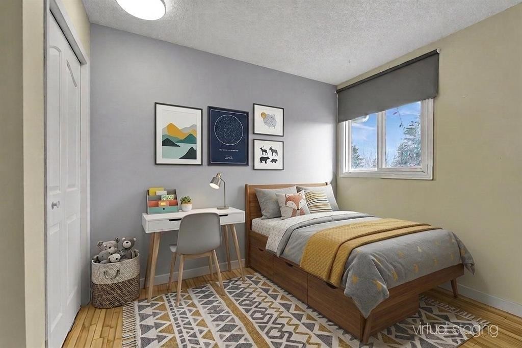 44 Strathclair Rise Sw, Calgary, AB - Indoor Photo Showing Bedroom