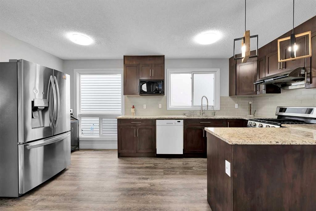 44 Strathclair Rise Sw, Calgary, AB - Indoor Photo Showing Kitchen With Stainless Steel Kitchen With Upgraded Kitchen