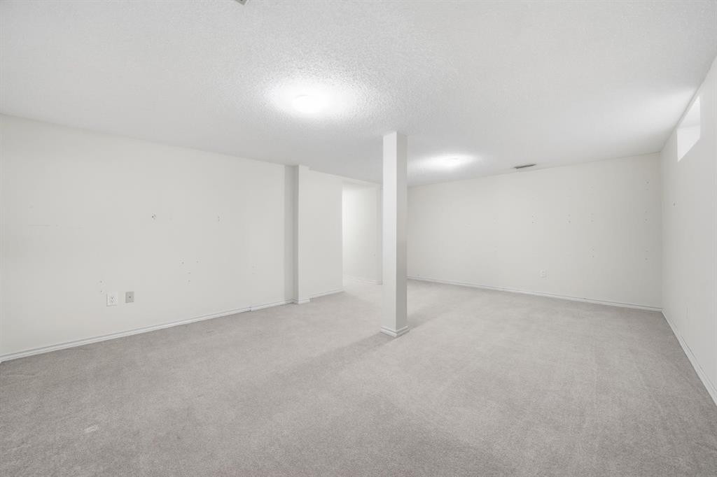 94 Mt Aberdeen Manor Se, Calgary, AB - Indoor Photo Showing Other Room
