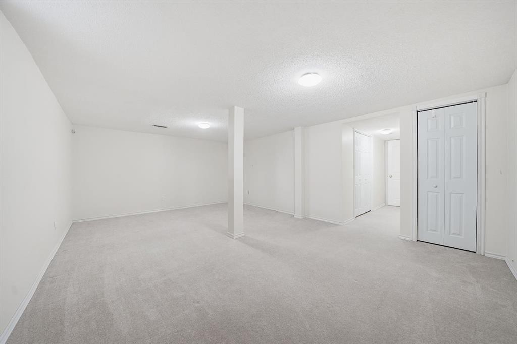 94 Mt Aberdeen Manor Se, Calgary, AB - Indoor Photo Showing Other Room
