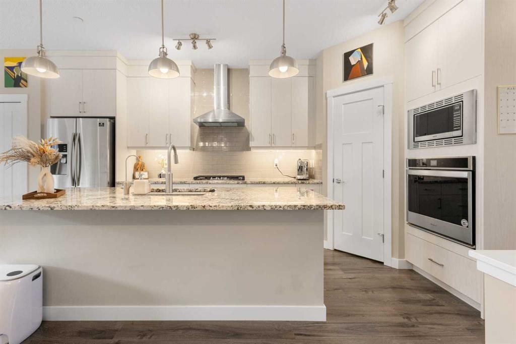 227 148 Avenue Nw, Calgary, AB - Indoor Photo Showing Kitchen With Stainless Steel Kitchen With Upgraded Kitchen