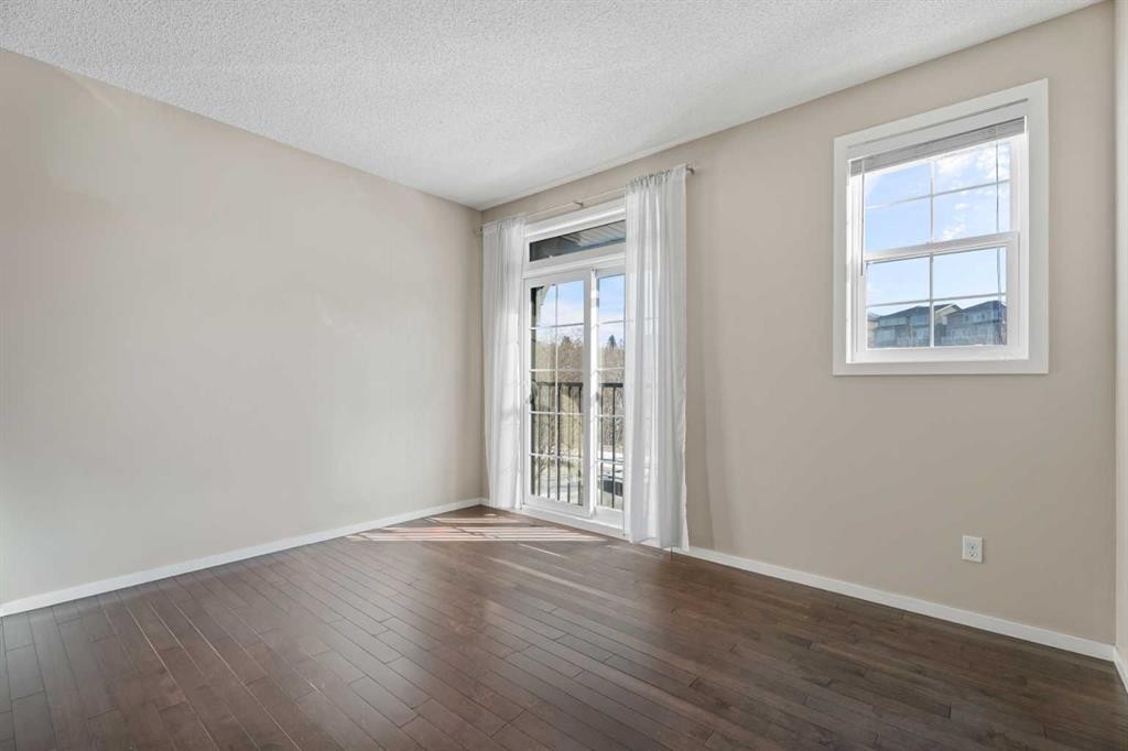 306 Ascot Circle Sw, Calgary, AB - Indoor Photo Showing Other Room