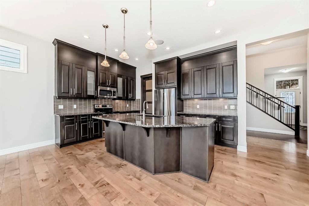 7904 Masters Boulevard Se, Calgary, AB - Indoor Photo Showing Kitchen With Upgraded Kitchen