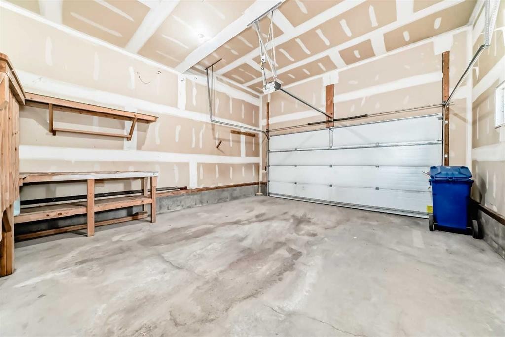 7904 Masters Boulevard Se, Calgary, AB - Indoor Photo Showing Garage