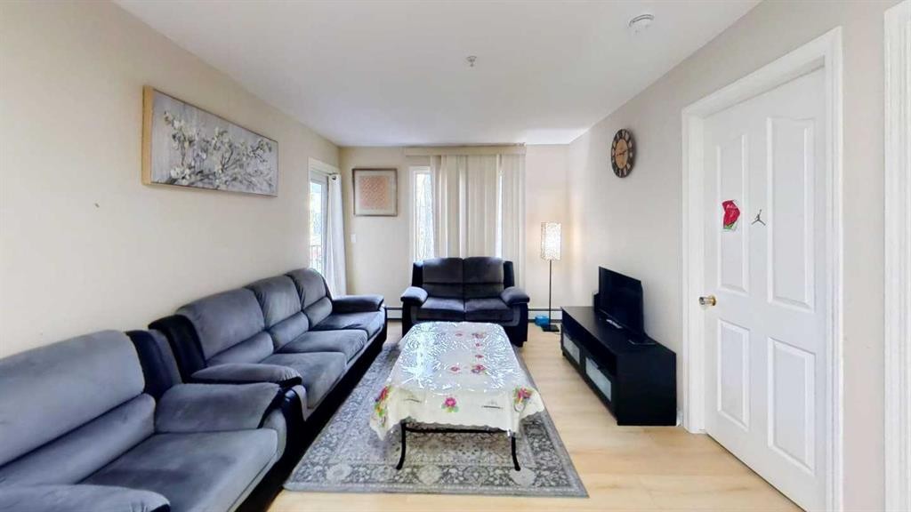 222-355 Taralake Way Ne, Calgary, AB - Indoor Photo Showing Living Room