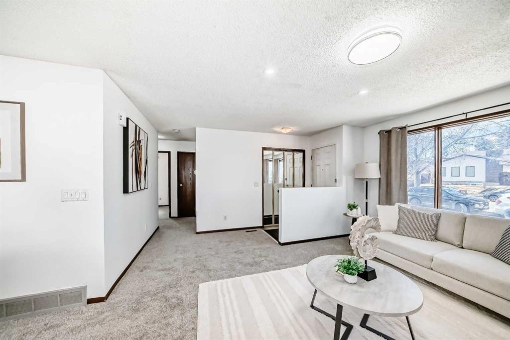 6735 Temple Drive Ne, Calgary, AB - Indoor Photo Showing Living Room